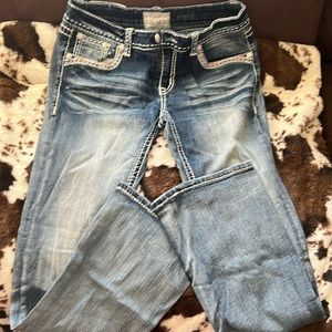 Size 30 grace bootcut jeans with a little scuff on leg